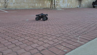 
              smax RC car and batman RC car zooming around the road and the smax crashes and tips the batman RC car
            